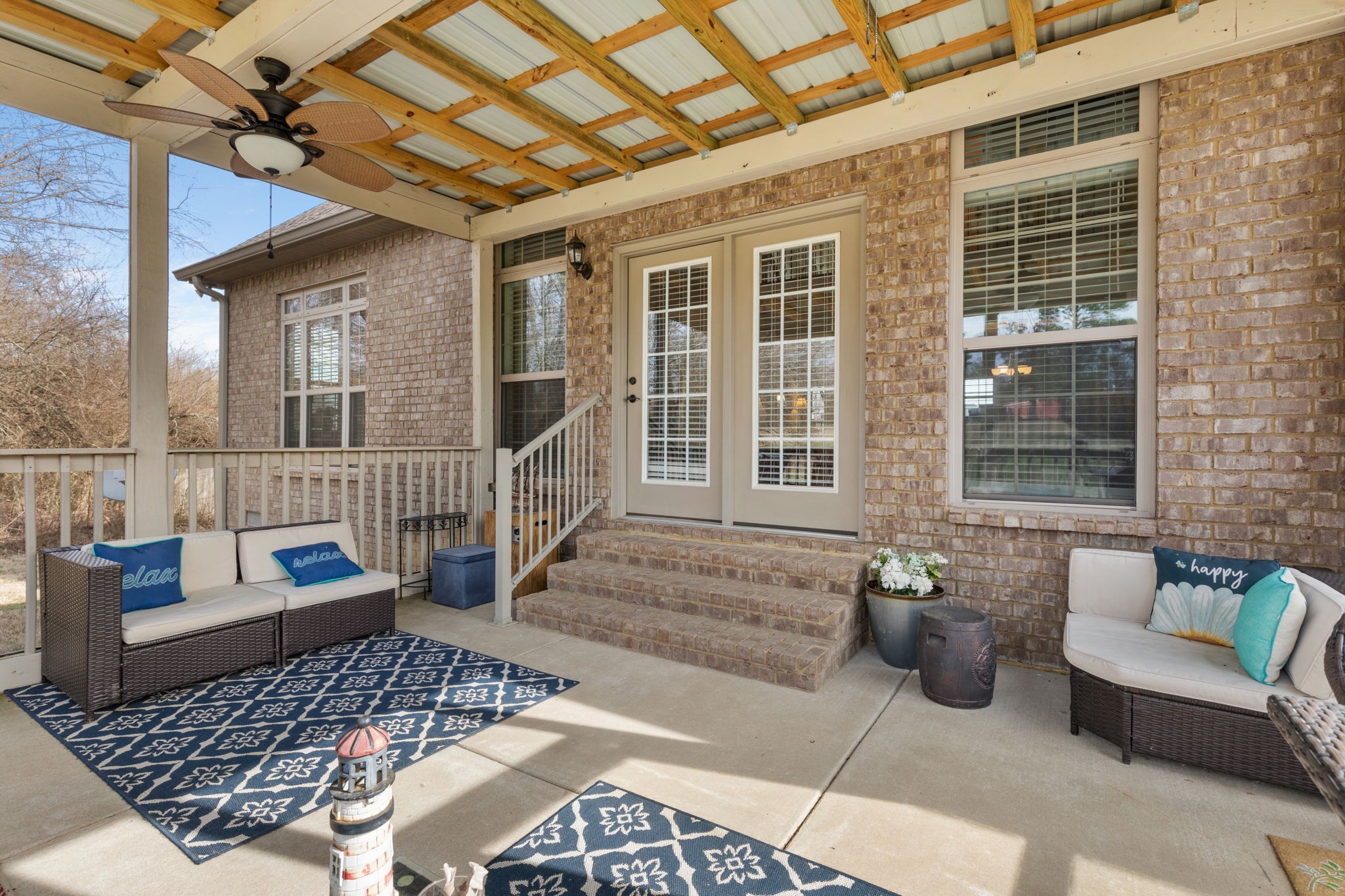 209 Hunters Ridge Drive Tullahoma, TN 37388 - Photo 5 of 54 a balcony with furniture and a potted plant