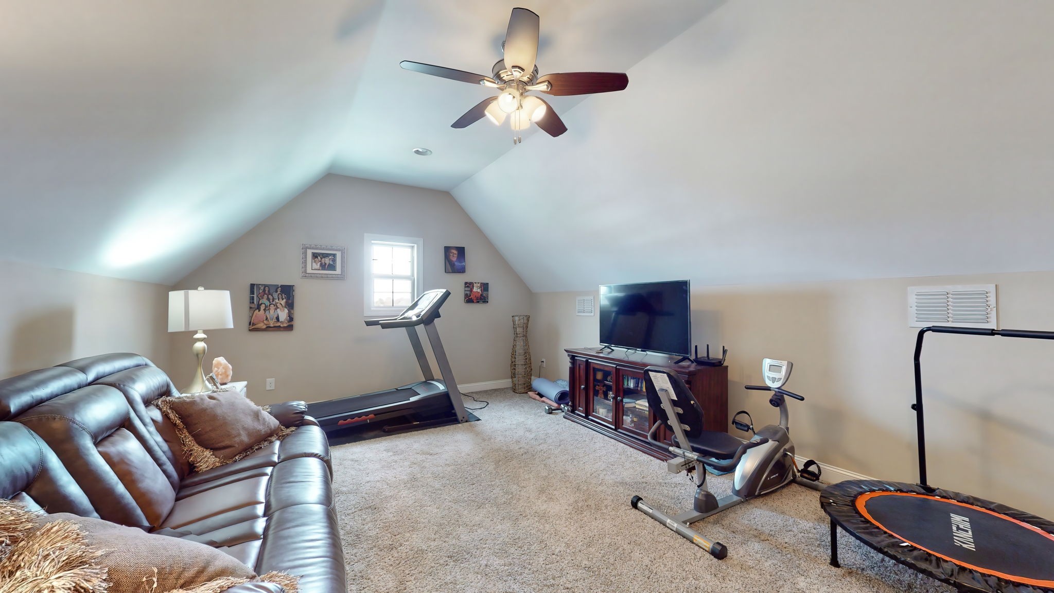 209 Hunters Ridge Drive Tullahoma, TN 37388 - Photo 51 of 54 a room with furniture and a ceiling fan