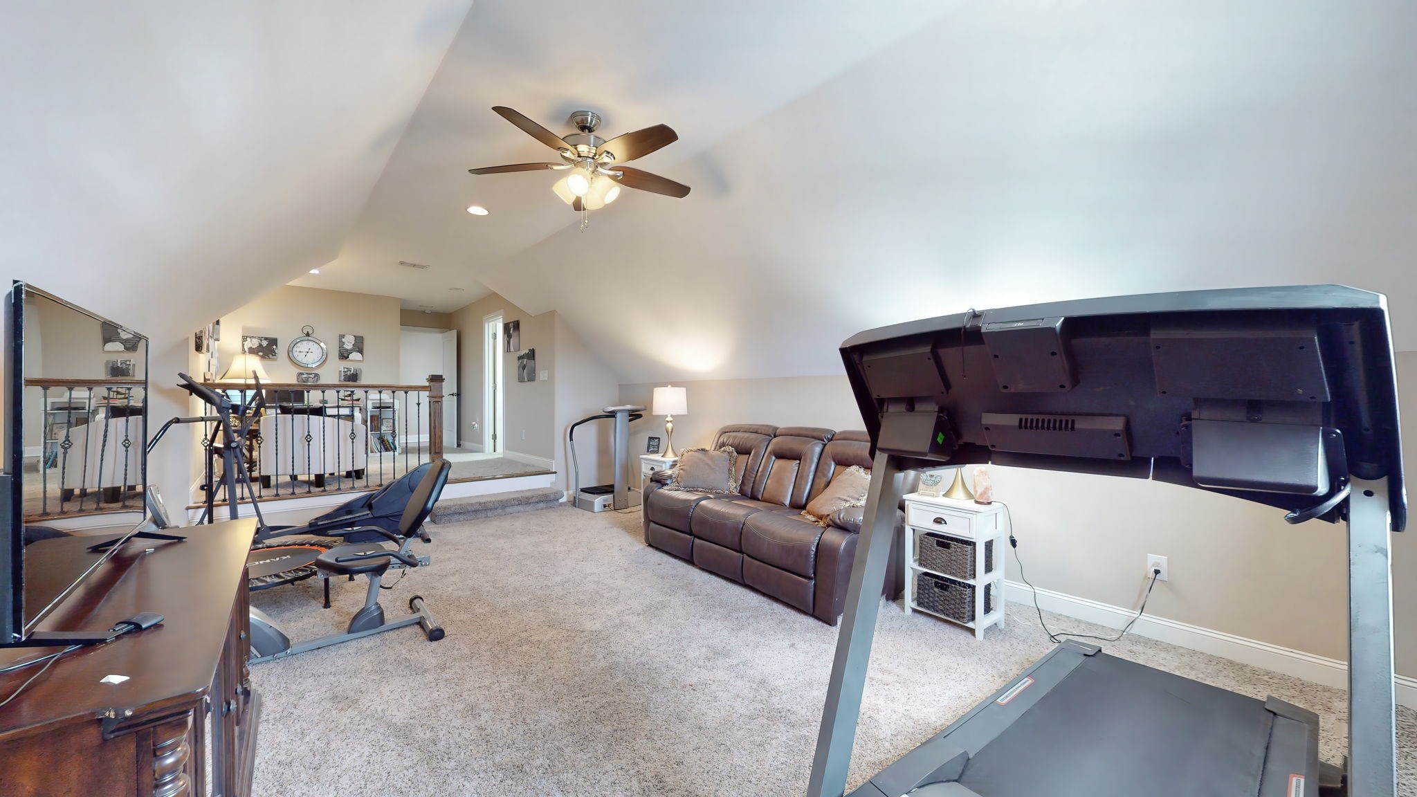 209 Hunters Ridge Drive Tullahoma, TN 37388 - Photo 53 of 54 a living room with furniture and a gym equipment