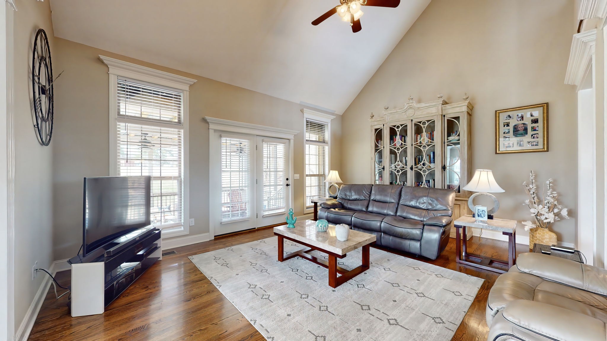 209 Hunters Ridge Drive Tullahoma, TN 37388 - Photo 9 of 54 a living room with furniture rug and wooden floor