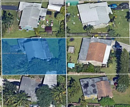 an aerial view of houses with outdoor space