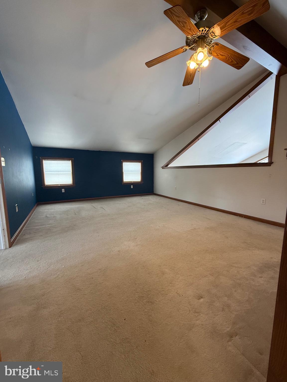 4776 Mcalevys Fort Road Petersburg, PA 16669 - Photo 44 of 75 a view of an empty room with a chandelier fan