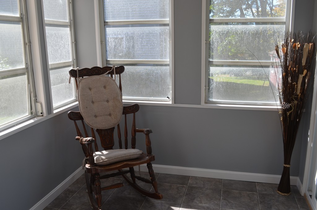 111 Acropolis Road Lowell, MA 01854 - Photo 15 of 15 a view of a room with a window and furniture