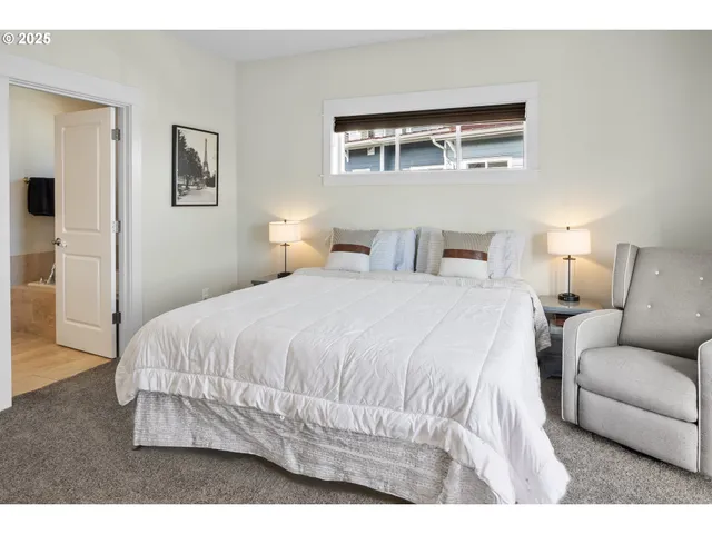 a bed room with a bed and a couch