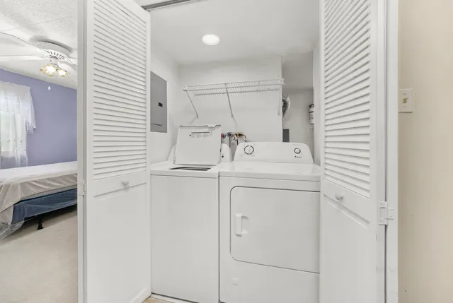 a view of a balcony with furniture