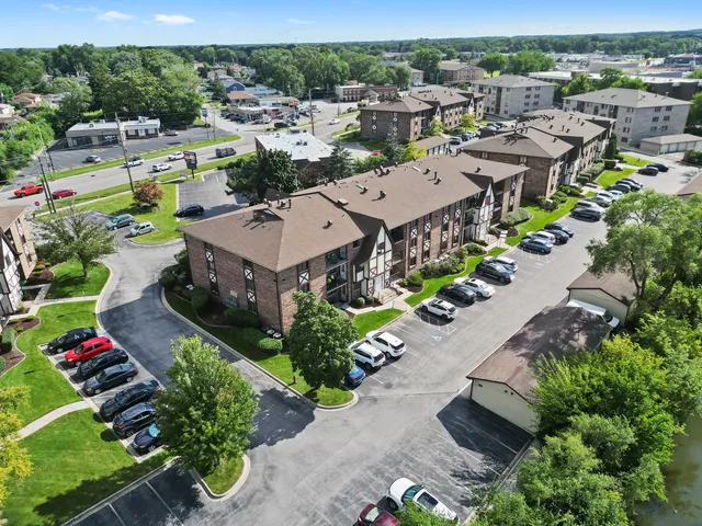 an aerial view of a house with a garden