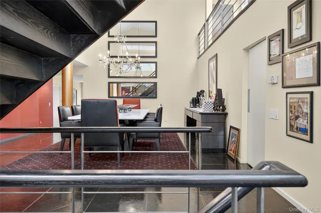 a dinning table and chairs in a room