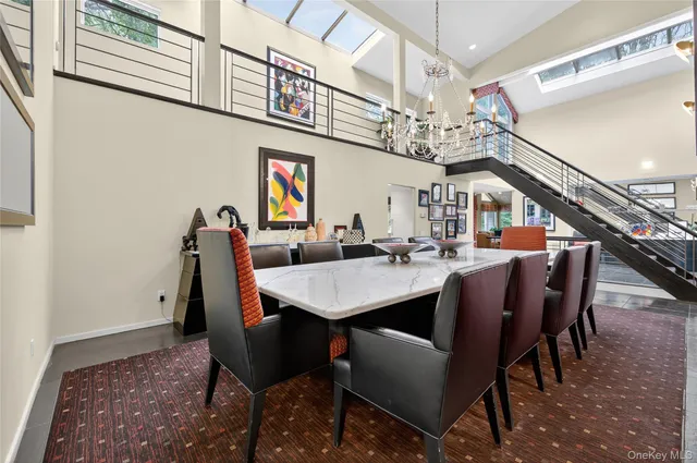 a view of a porch with furniture and garden