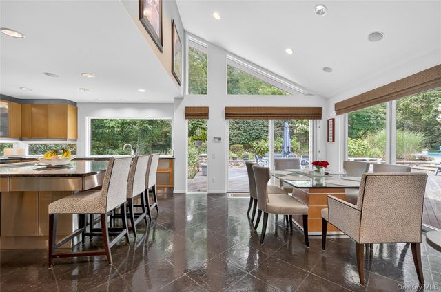 a kitchen with stainless steel appliances granite countertop a stove and a sink