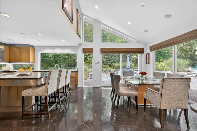 a kitchen with stainless steel appliances granite countertop a stove and a sink
