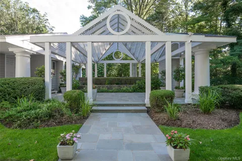 a view of a house with a garden