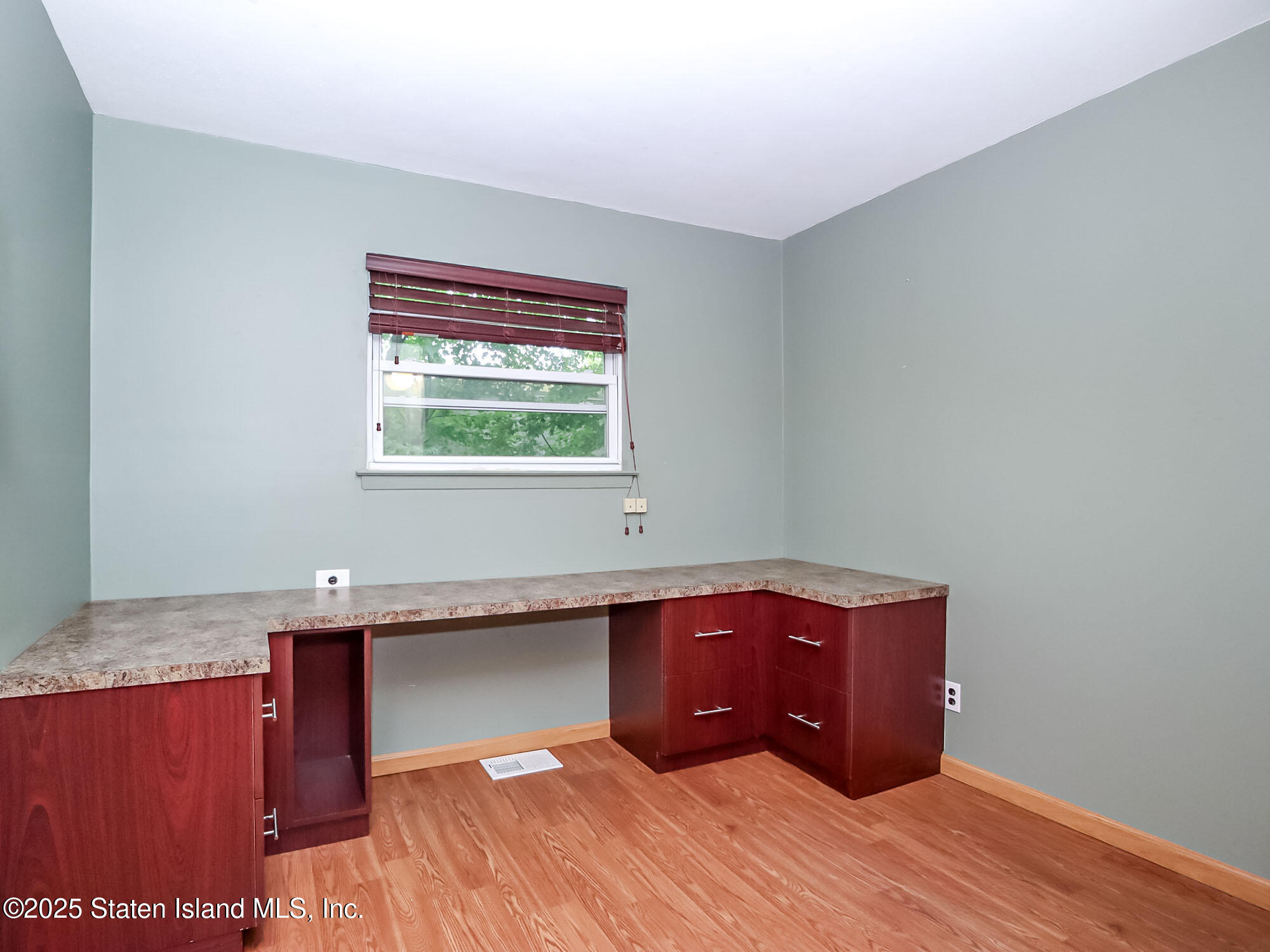 264 Timber Ridge Drive Staten Island, NY 10306 - Photo 15 of 31 a room with a bed and a window