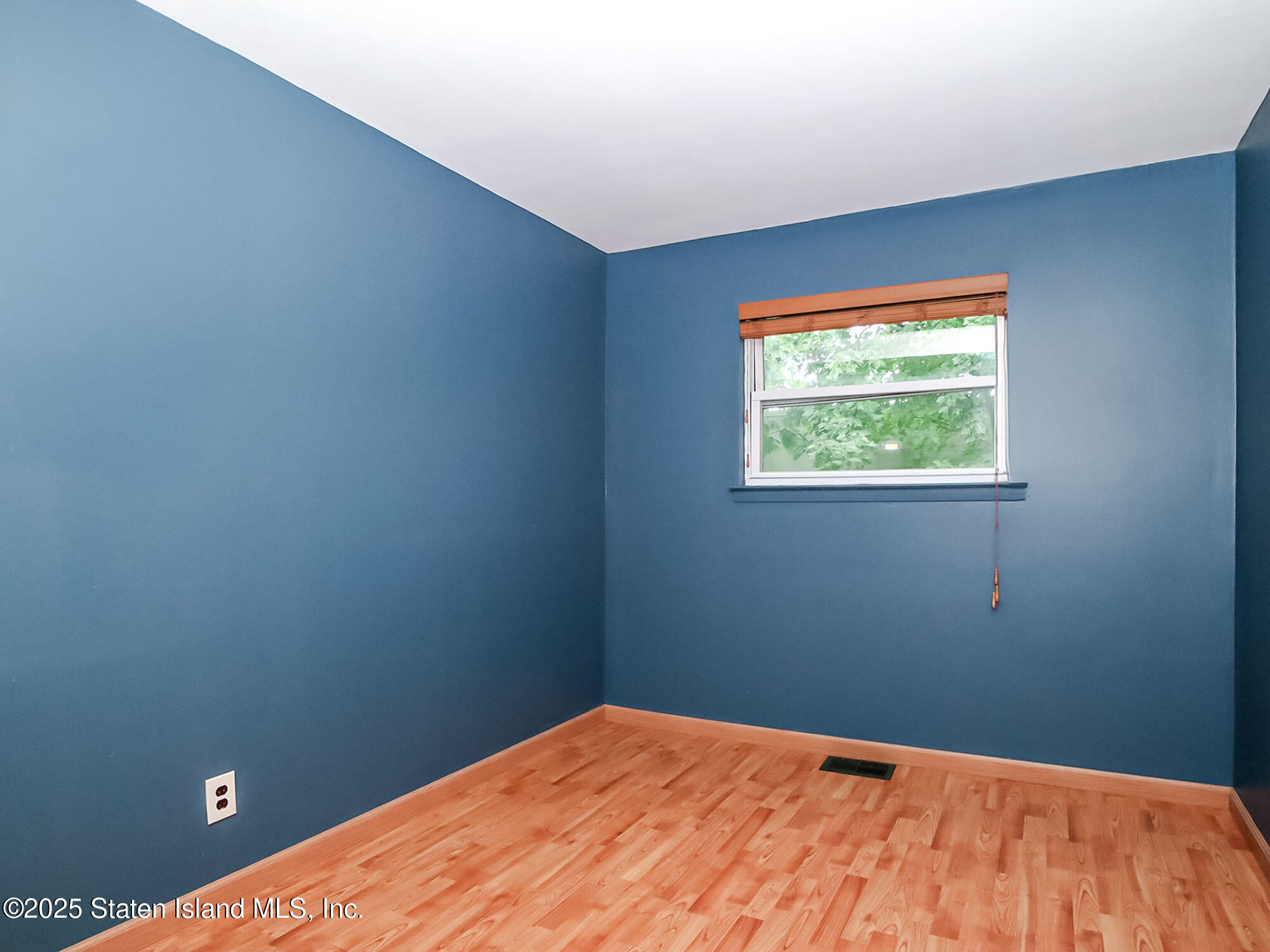 264 Timber Ridge Drive Staten Island, NY 10306 - Photo 17 of 31 a view of a big room with windows