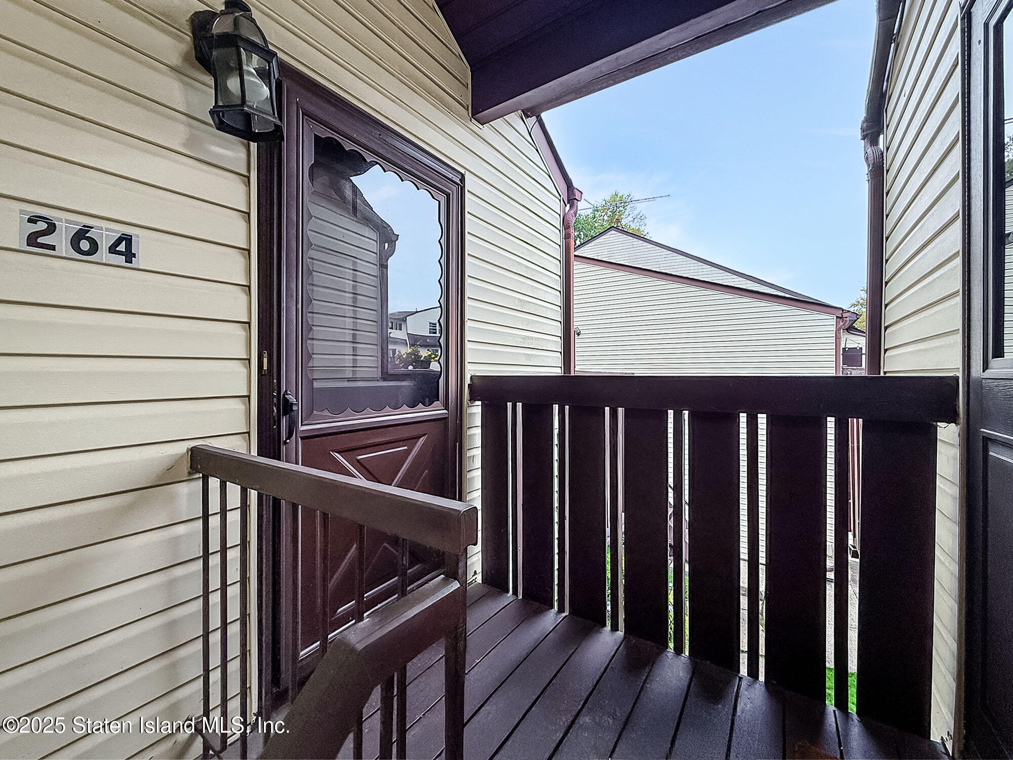 264 Timber Ridge Drive Staten Island, NY 10306 - Photo 3 of 31 a view of wooden balcony