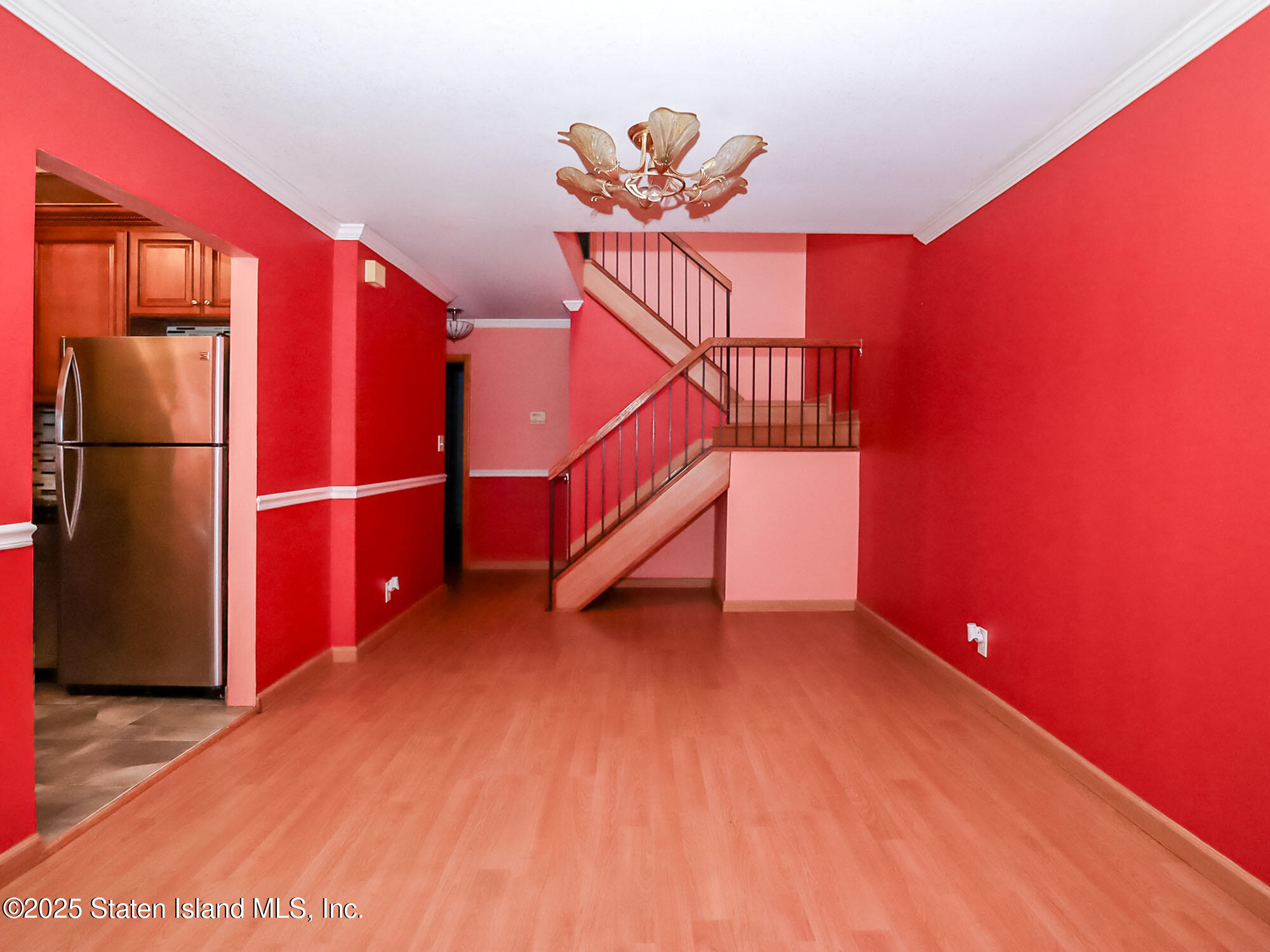 264 Timber Ridge Drive Staten Island, NY 10306 - Photo 6 of 31 a view of entryway with wooden floor