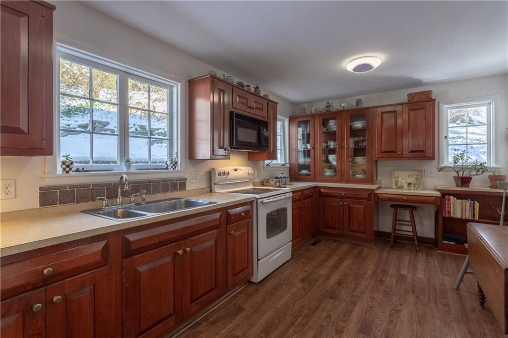 323 Sycamore Road Sewickley, PA 15143 - Photo 8 of 22 Wonderful counter space and storage in this kitchen.