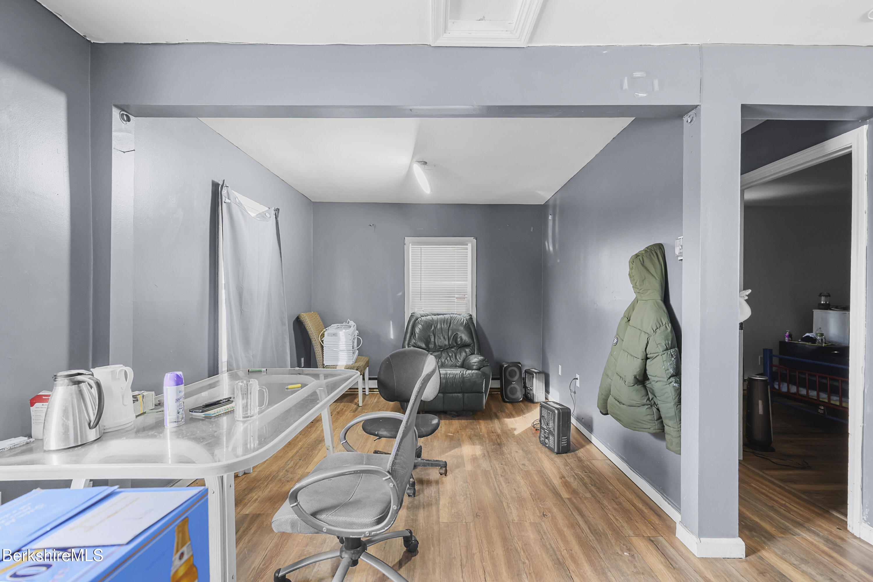 1 1/2 Cherry Street Pittsfield, MA 01201 - Photo 4 of 23 a view of a kitchen with dining table and chairs
