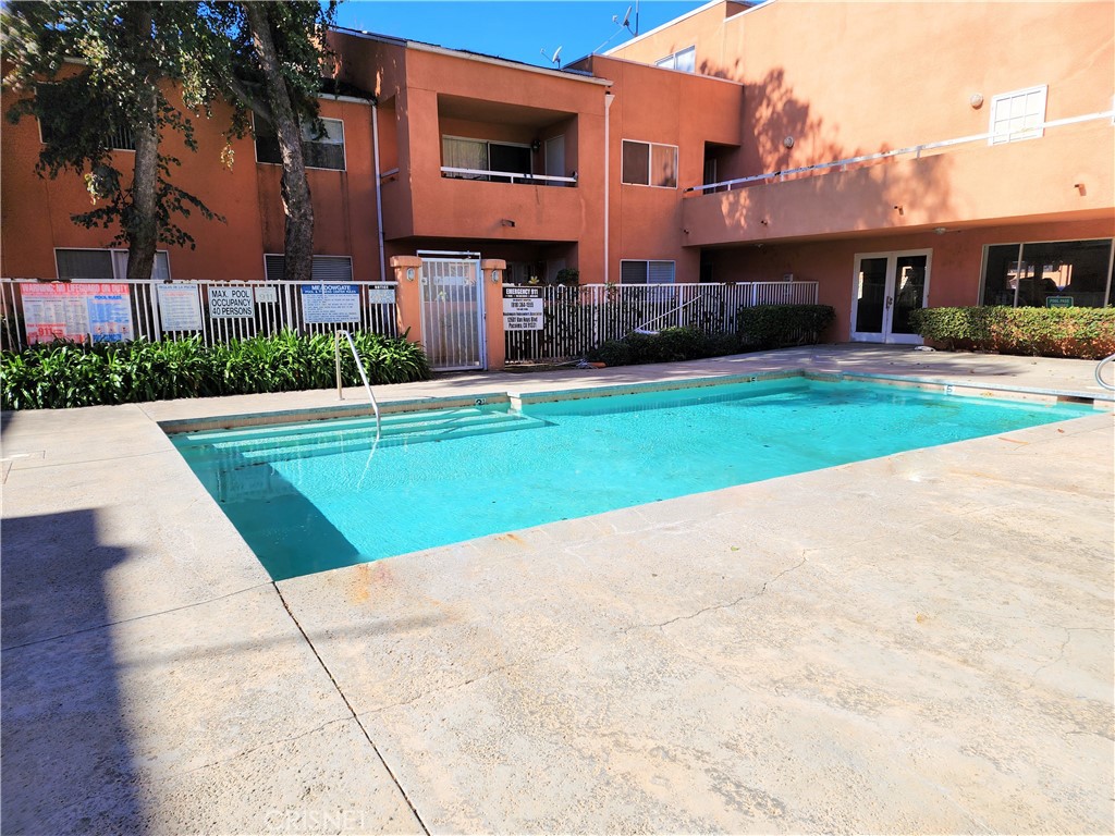12601 Van Nuys Boulevard, Unit 138 Pacoima, CA 91331 - Photo 17 of 19 a house view with a garden space