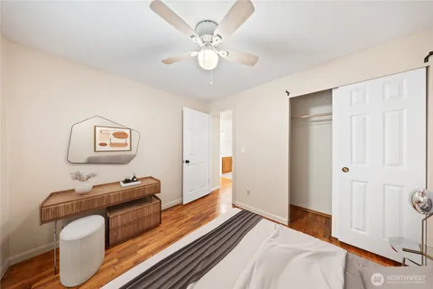 a bedroom with furniture and a window
