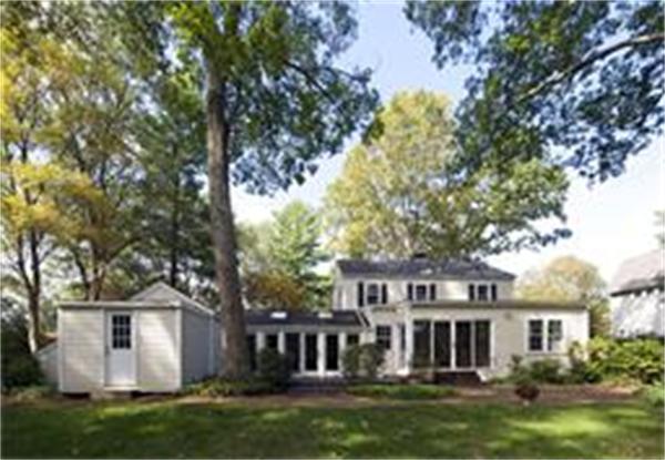 61 Fox Run Road Hamilton, MA 01982 - Photo 3 of 13 a front view of a house with a garden