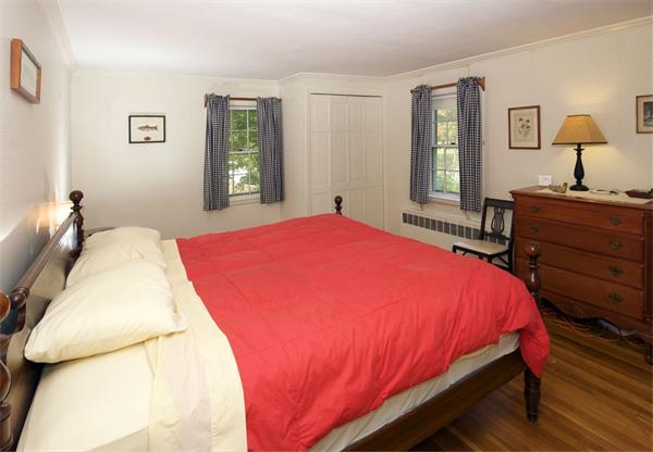 61 Fox Run Road Hamilton, MA 01982 - Photo 10 of 13 a bedroom with a bed and a window