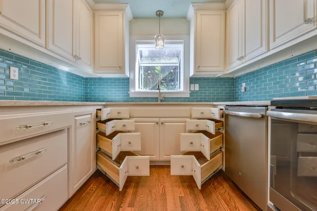 a utility room with cabinets