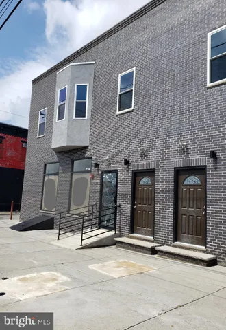 a kitchen with stainless steel appliances granite countertop a refrigerator sink and cabinets