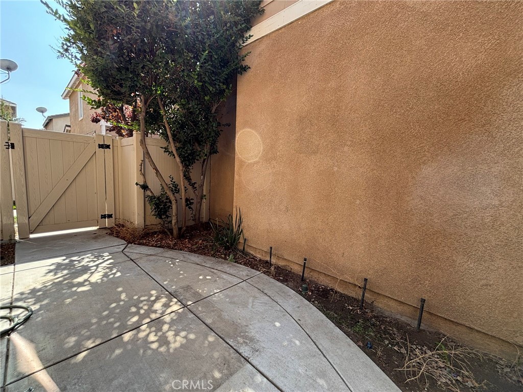 1890 Flint Court Riverside, CA 92501 - Photo 19 of 25 a view of a backyard of the house