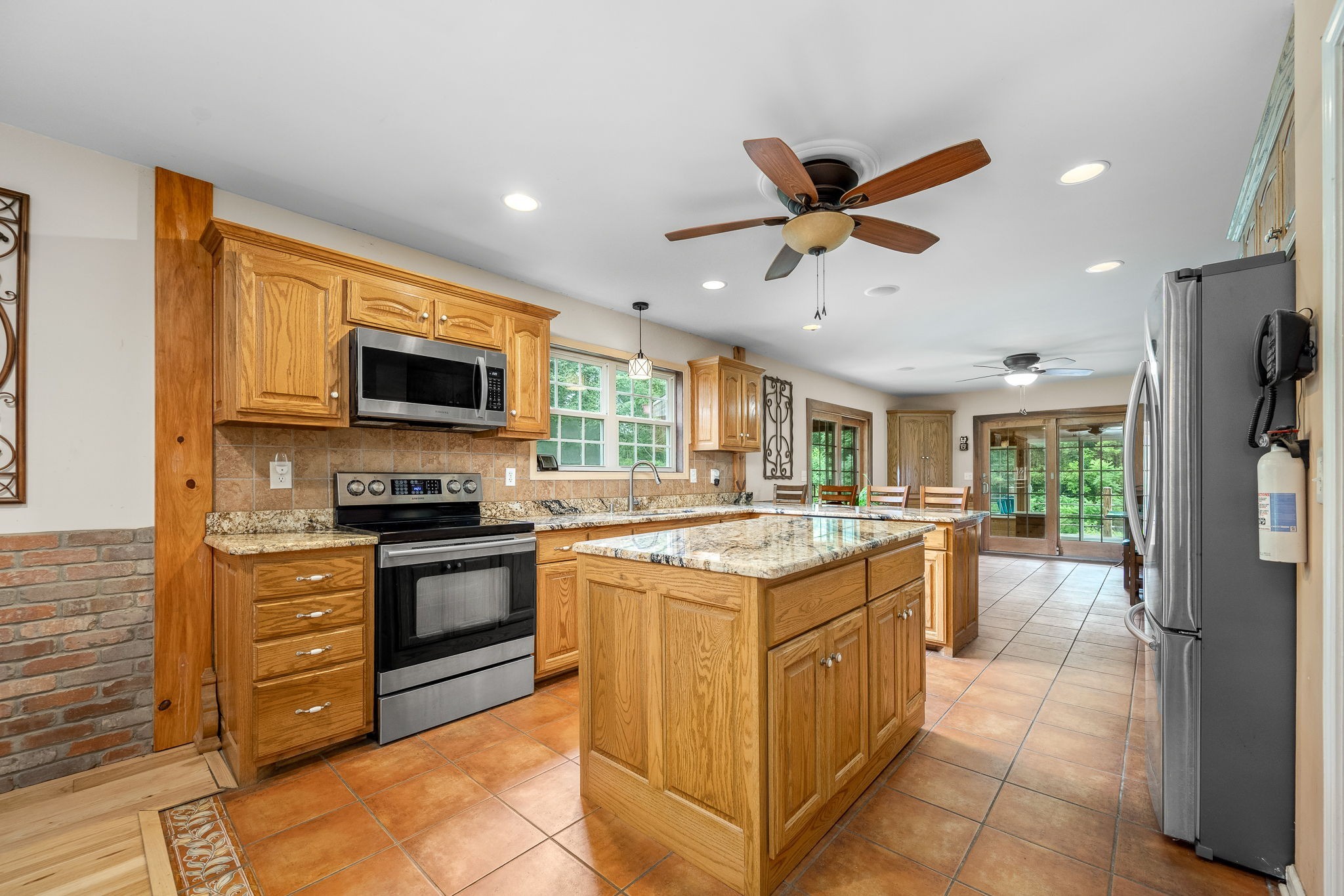 745 Union Ridge Road Wartrace, TN 37183 - Photo 13 of 76 a kitchen with a stove a sink and a refrigerator