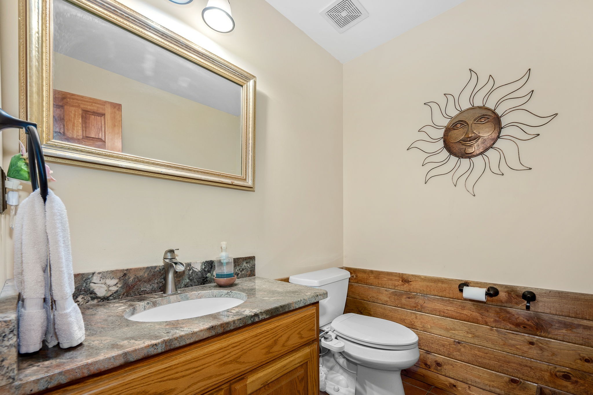 745 Union Ridge Road Wartrace, TN 37183 - Photo 27 of 76 a bathroom with a granite countertop toilet sink and mirror