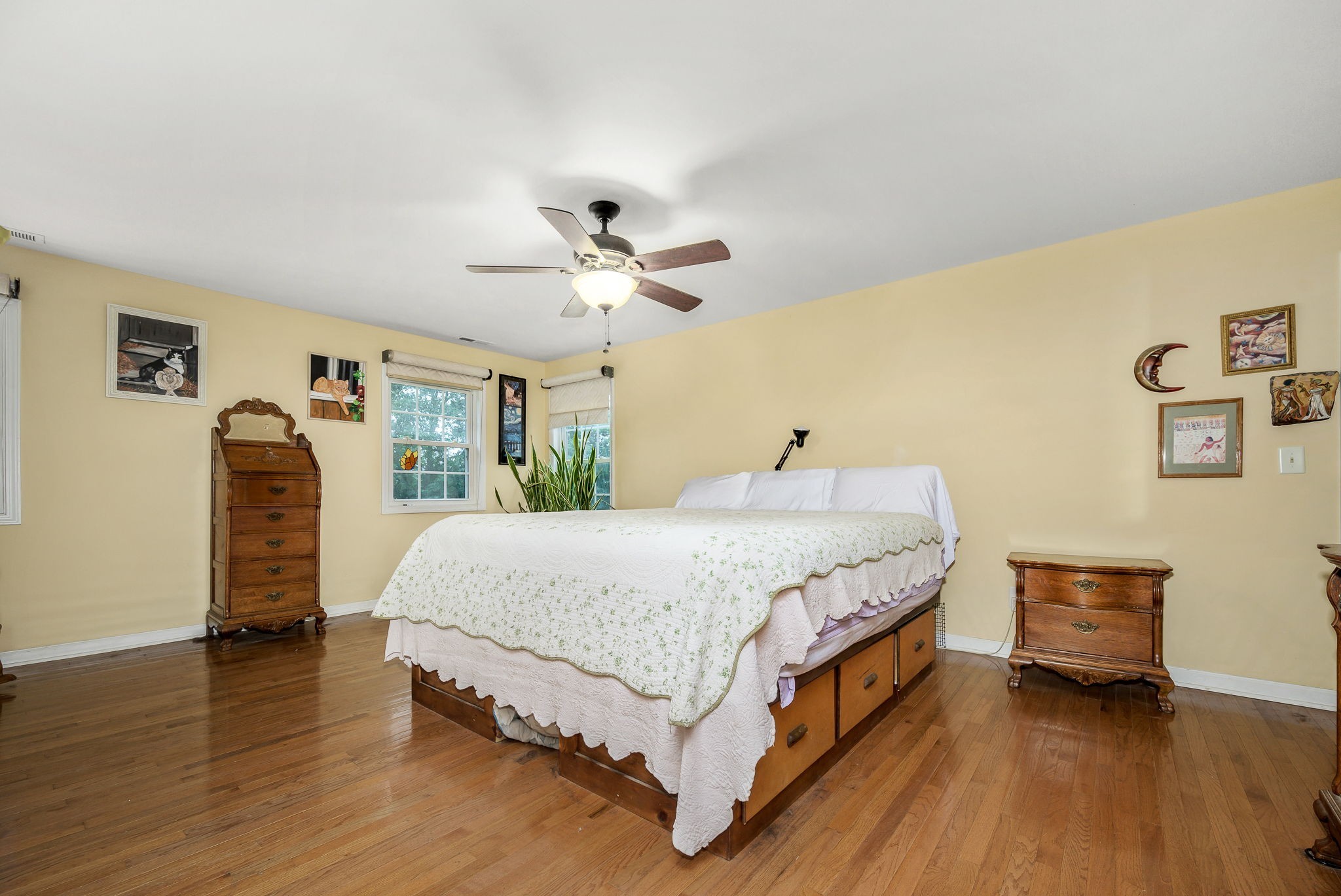 745 Union Ridge Road Wartrace, TN 37183 - Photo 31 of 76 a spacious bedroom with a bed a dresser and wooden floor