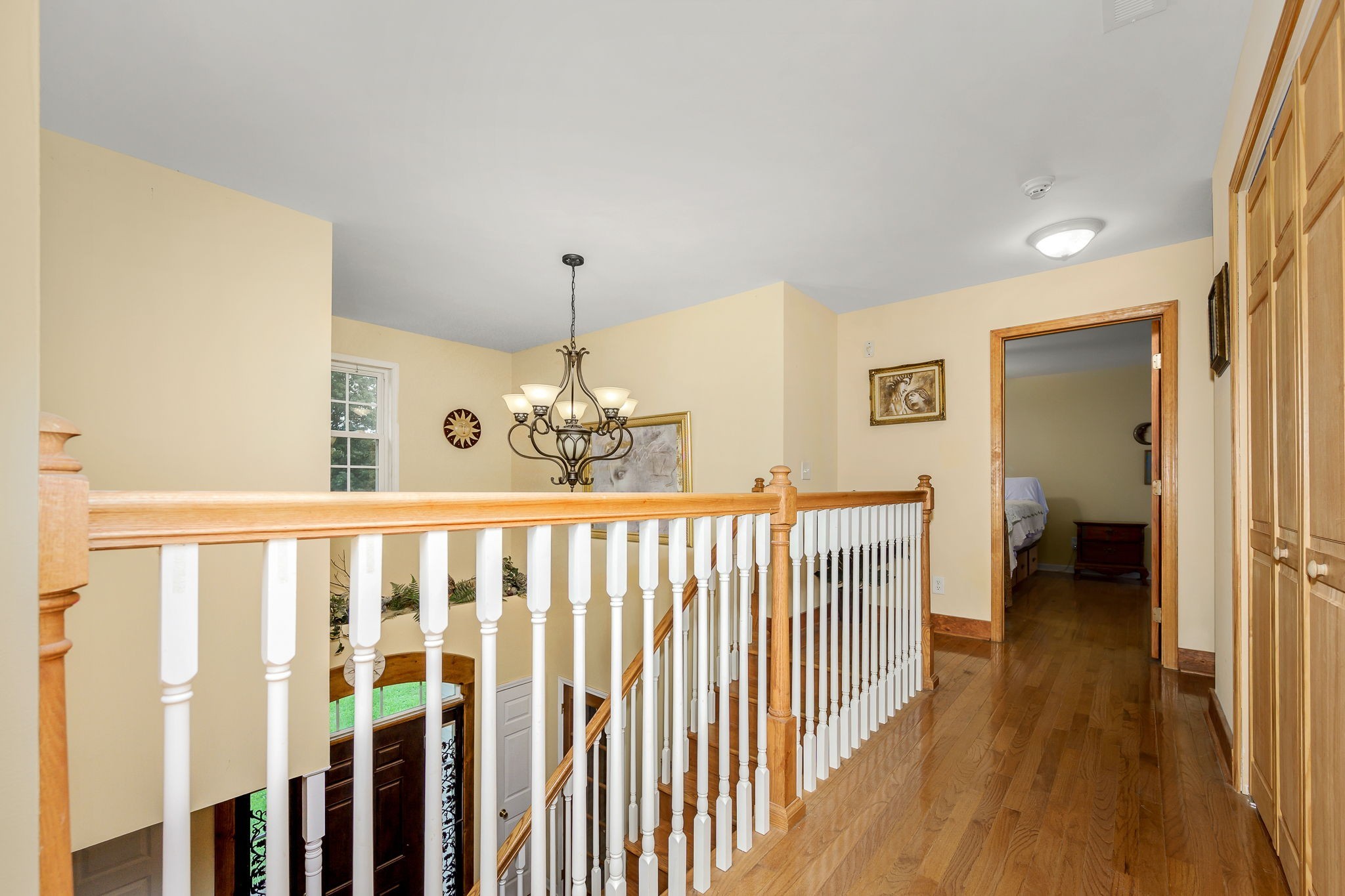 745 Union Ridge Road Wartrace, TN 37183 - Photo 38 of 76 a view of a hallway with wooden floor and chandelier
