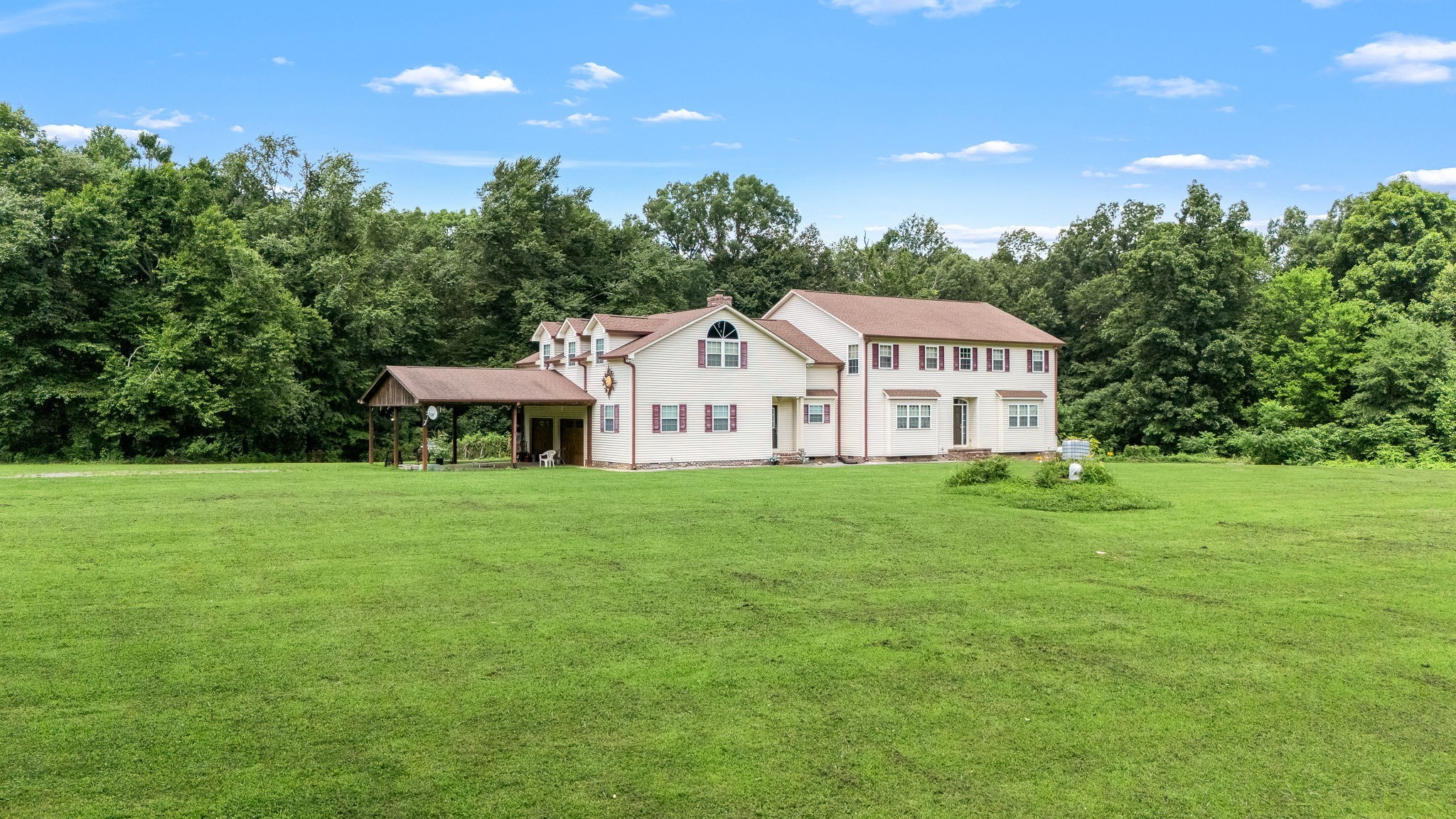 745 Union Ridge Road Wartrace, TN 37183 - Photo 50 of 76 a view of a house with a big yard and large trees