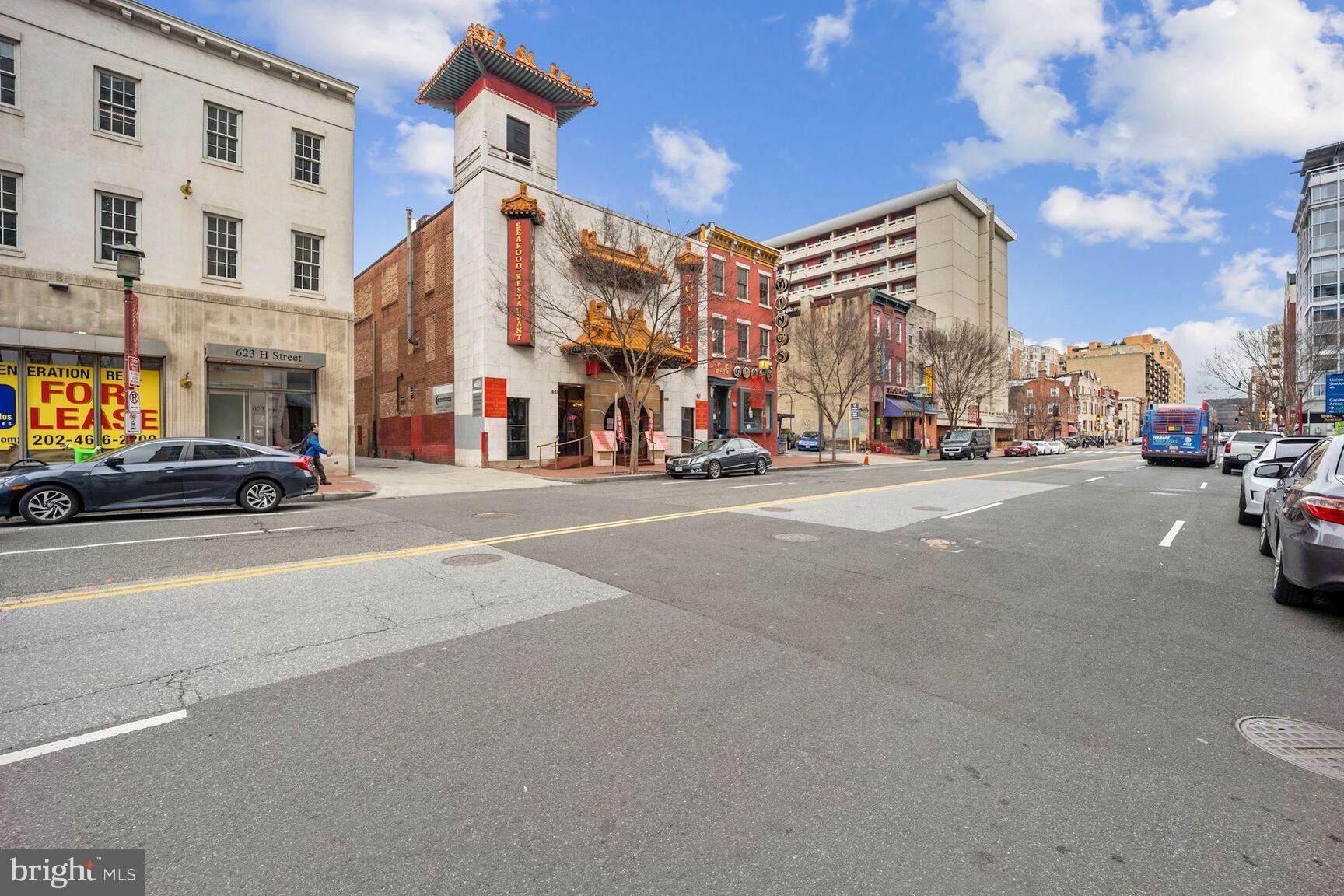 616 E Street Northwest, Unit 1150 Washington, DC 20004 - Photo 43 of 75 a view of a street with cars and buildings