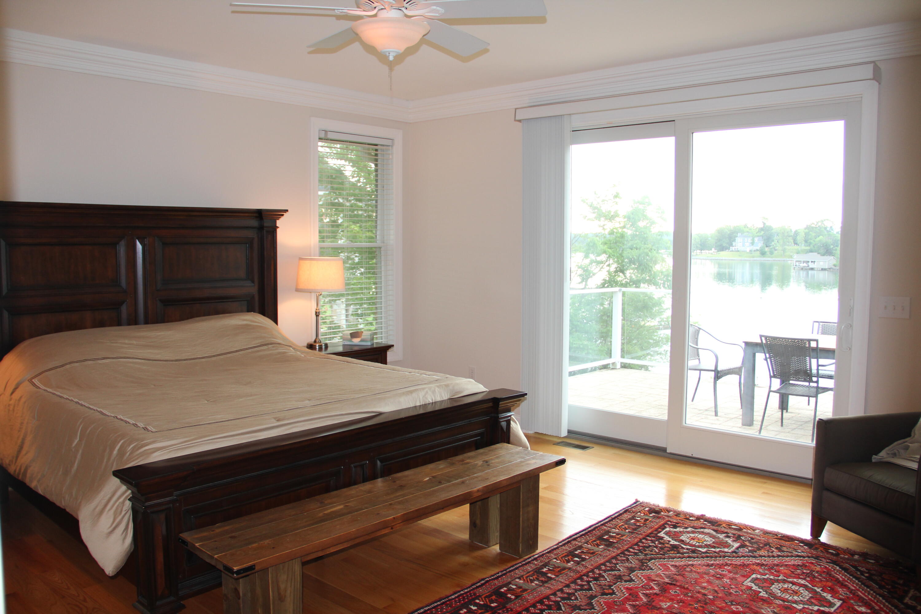 4 Calypso Road Moneta, VA 24121 - Photo 32 of 78 a bed sitting in a bedroom next to a window
