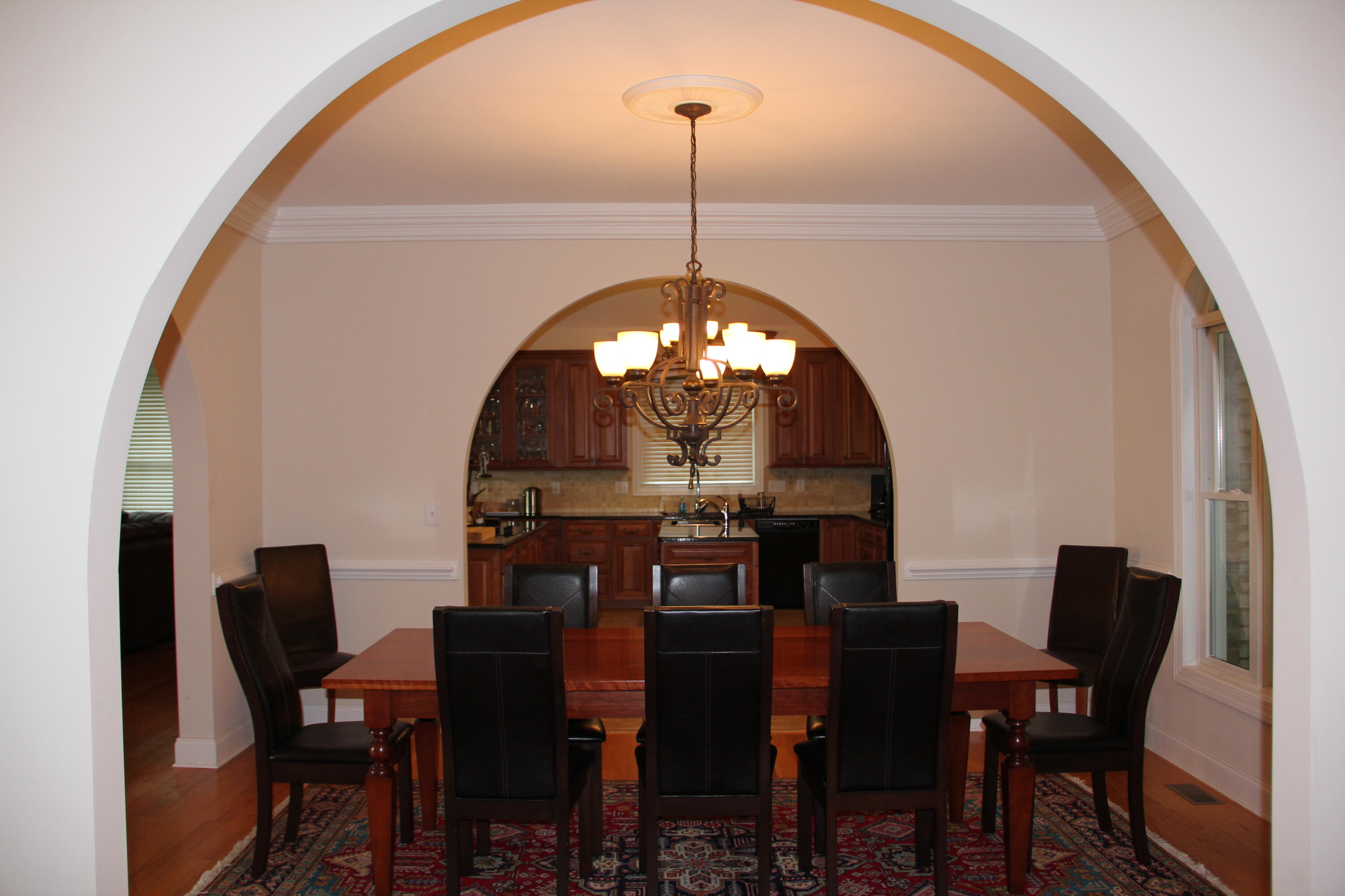 4 Calypso Road Moneta, VA 24121 - Photo 4 of 78 a view of a dining room with furniture and wooden floor