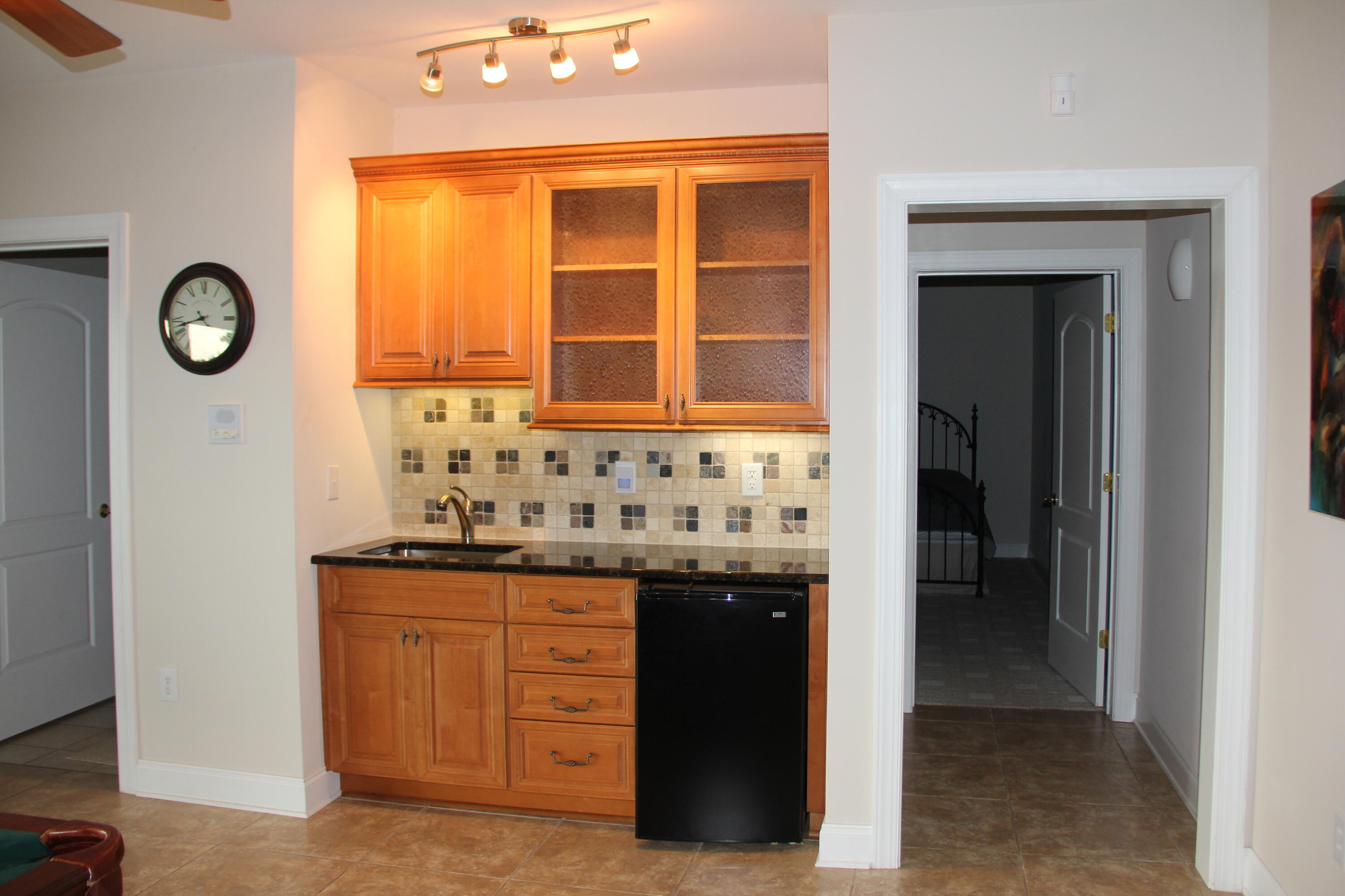 4 Calypso Road Moneta, VA 24121 - Photo 44 of 78 a kitchen with granite countertop a sink and a stove