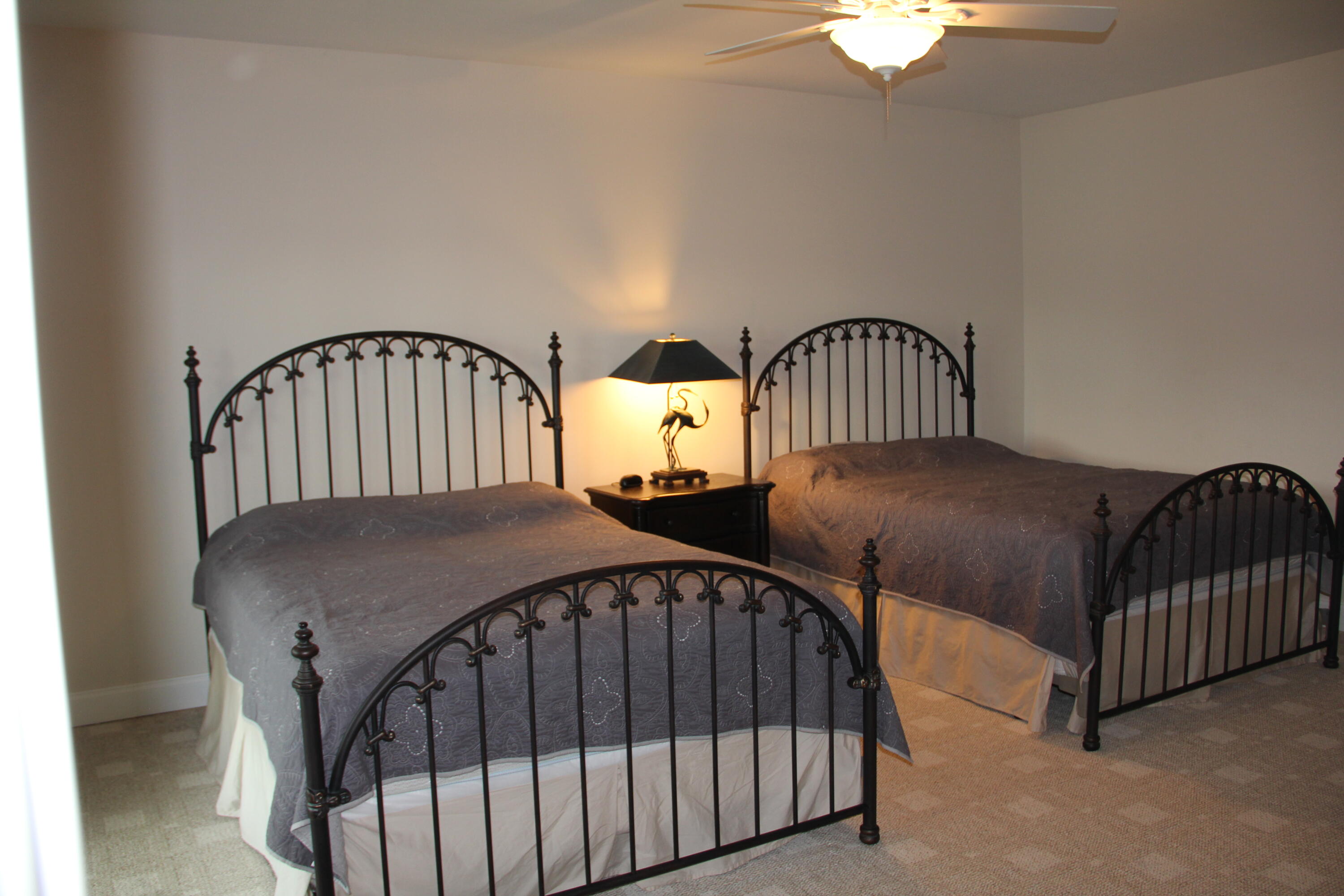 4 Calypso Road Moneta, VA 24121 - Photo 49 of 78 a view of a bedroom with two beds and wooden floor