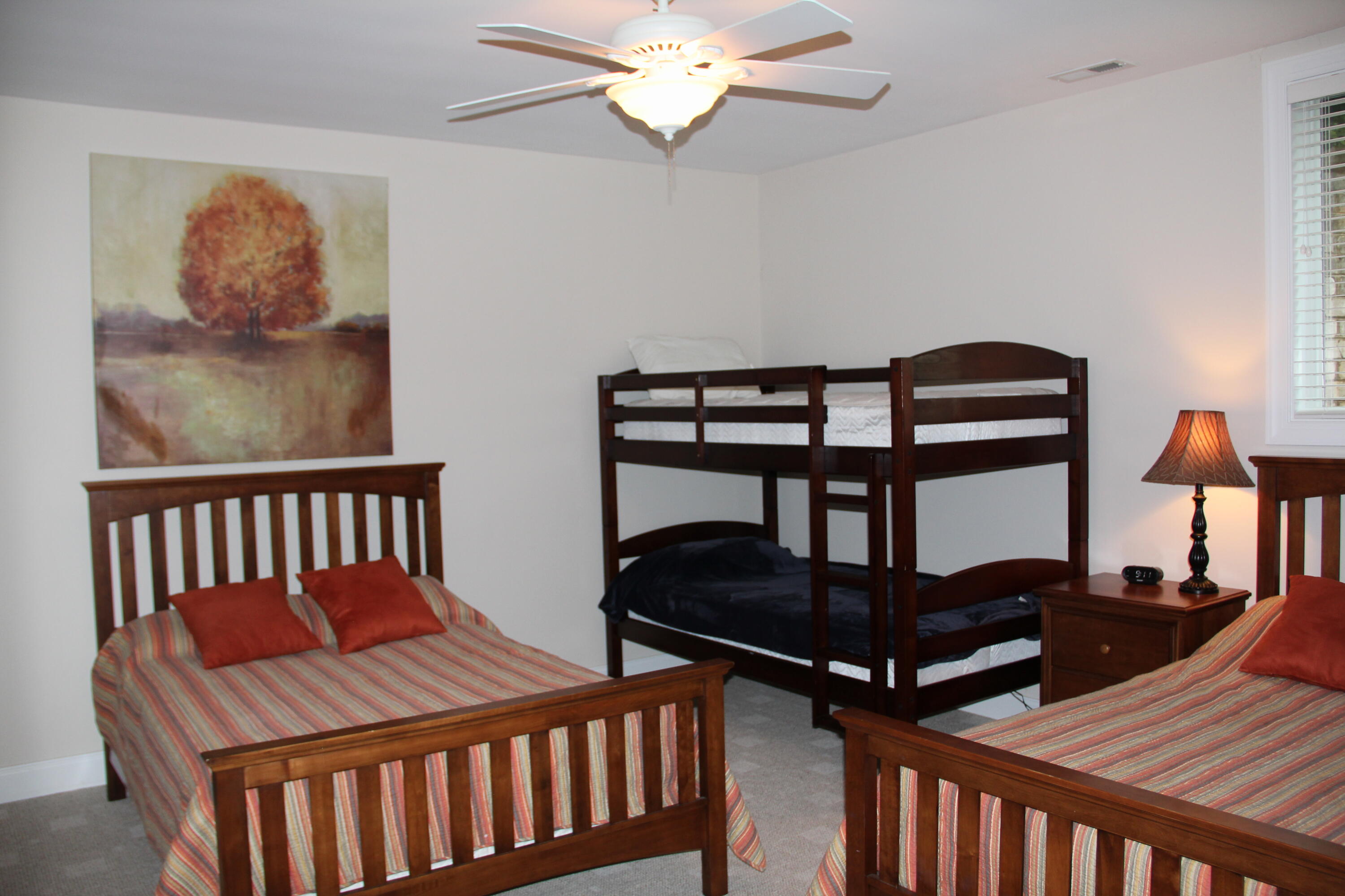 4 Calypso Road Moneta, VA 24121 - Photo 54 of 78 a bedroom with furniture and a chandelier