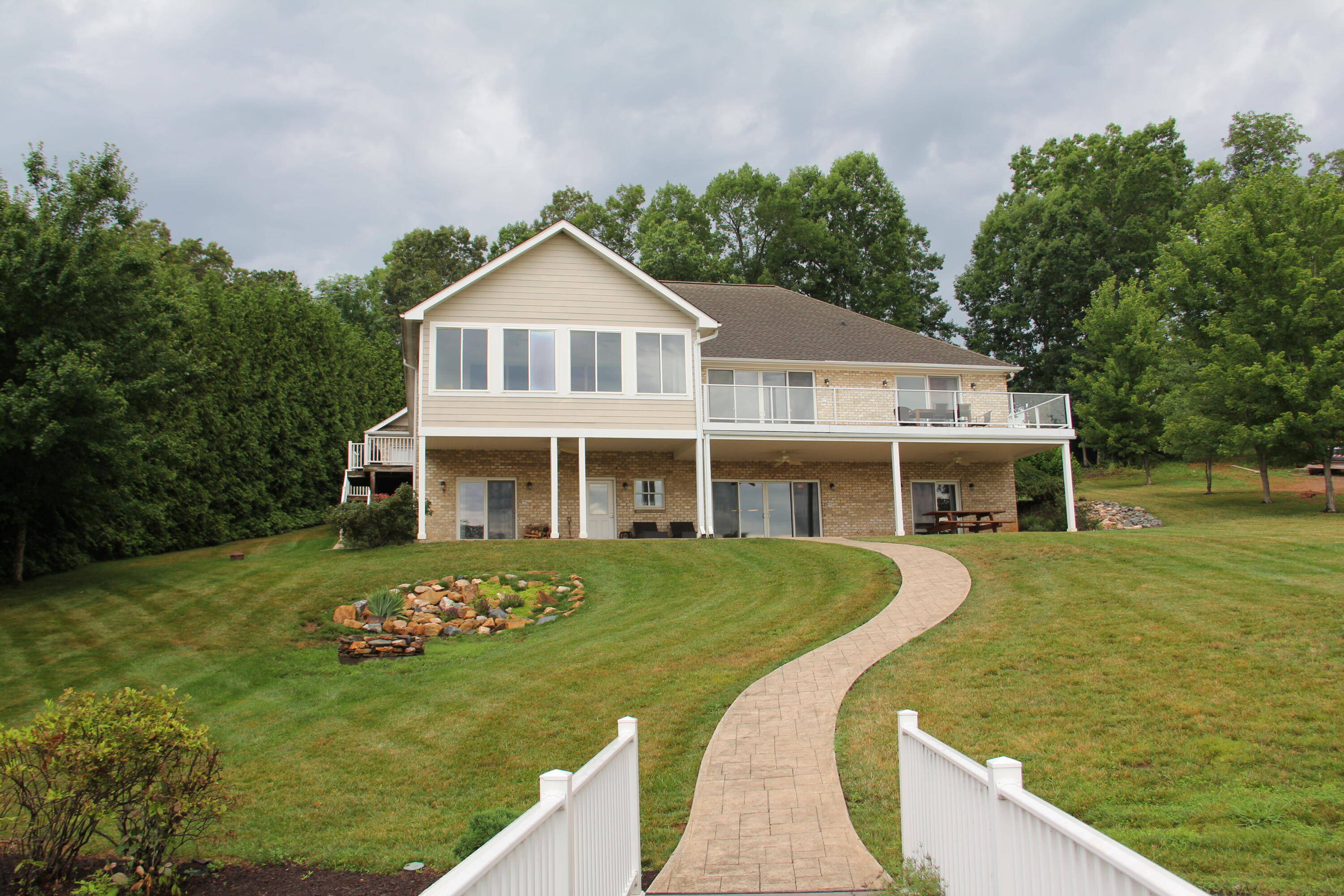 4 Calypso Road Moneta, VA 24121 - Photo 59 of 78 a front view of a house with garden