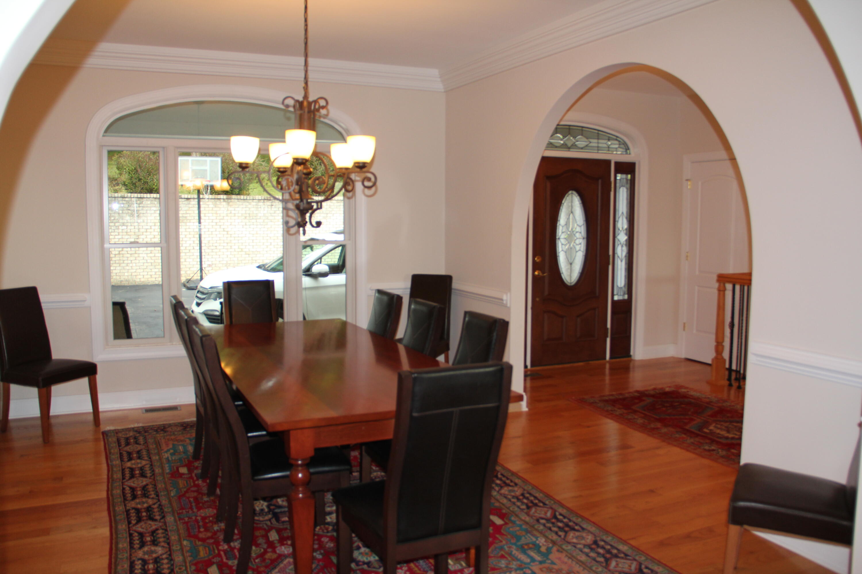 4 Calypso Road Moneta, VA 24121 - Photo 6 of 78 a dining room with furniture a chandelier and wooden floor