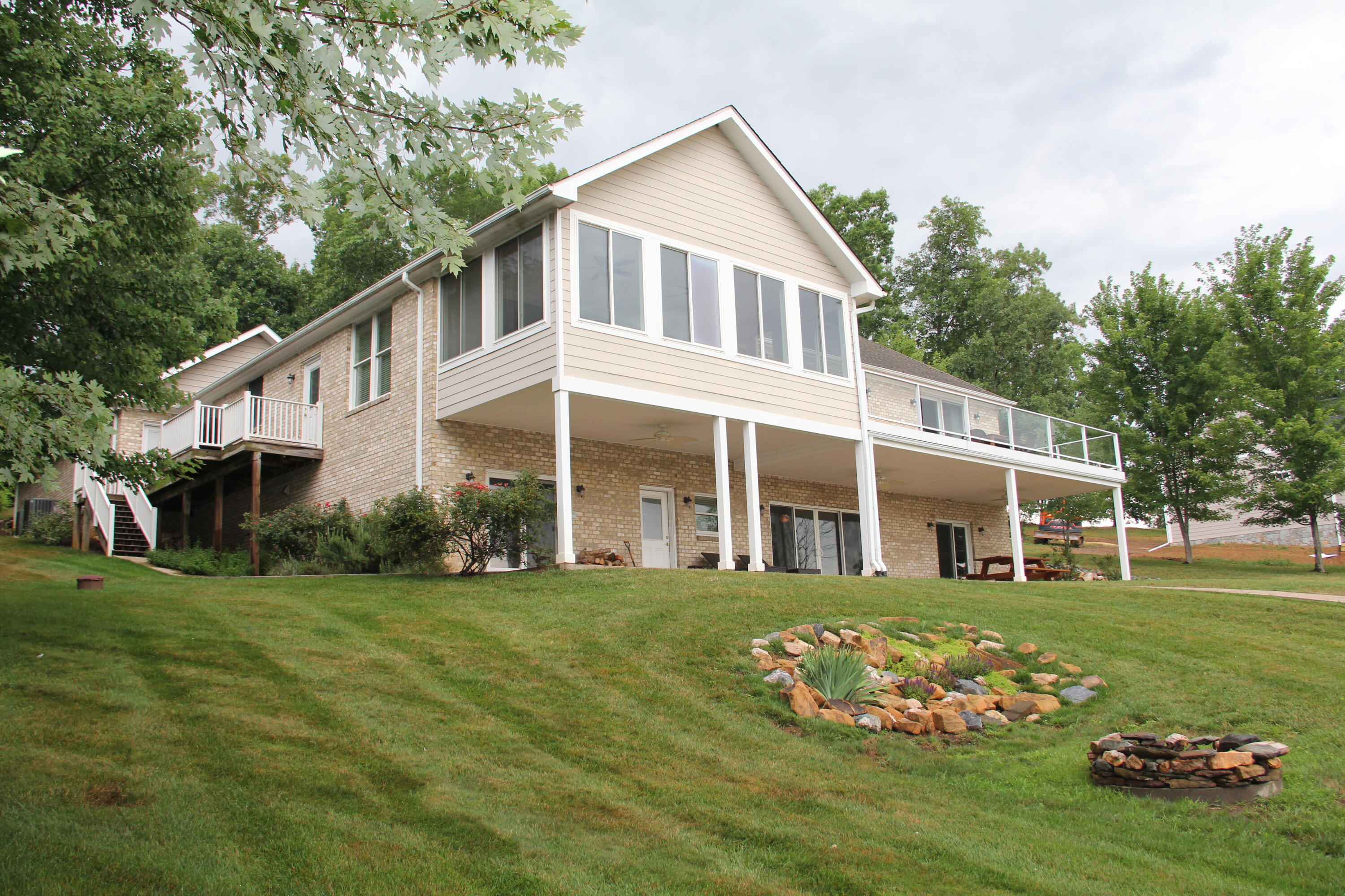 4 Calypso Road Moneta, VA 24121 - Photo 69 of 78 a front view of a house with a garden