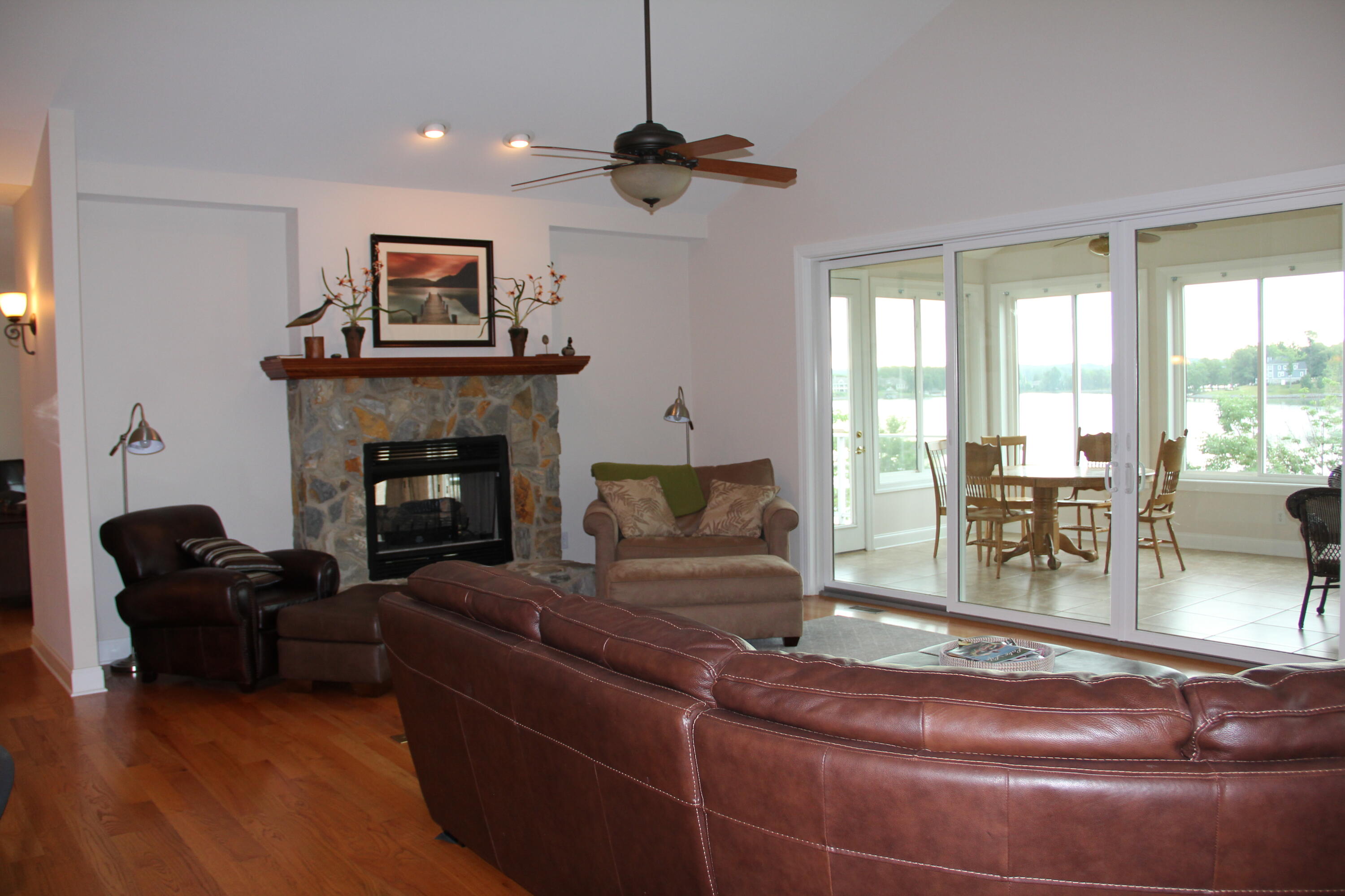 4 Calypso Road Moneta, VA 24121 - Photo 9 of 78 a living room with furniture and a fireplace