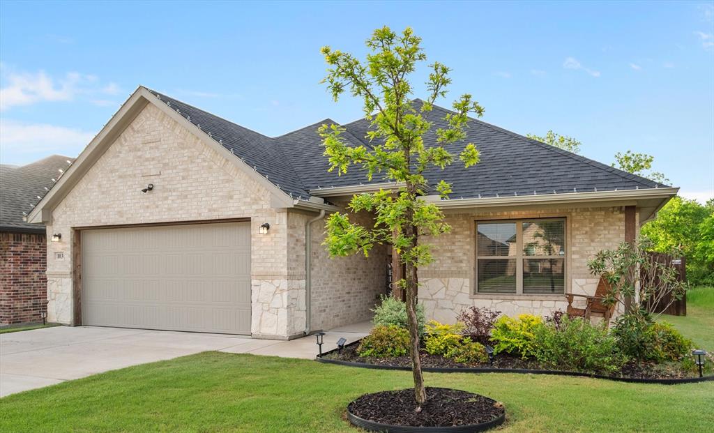 103 Randal Row Corsicana, TX 75110 - Photo 4 of 35 a front view of a house with a yard