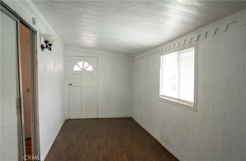 250 North Linden Avenue, Unit 248 Rialto, CA 92376 - Photo 8 of 13 an empty room with windows and closet