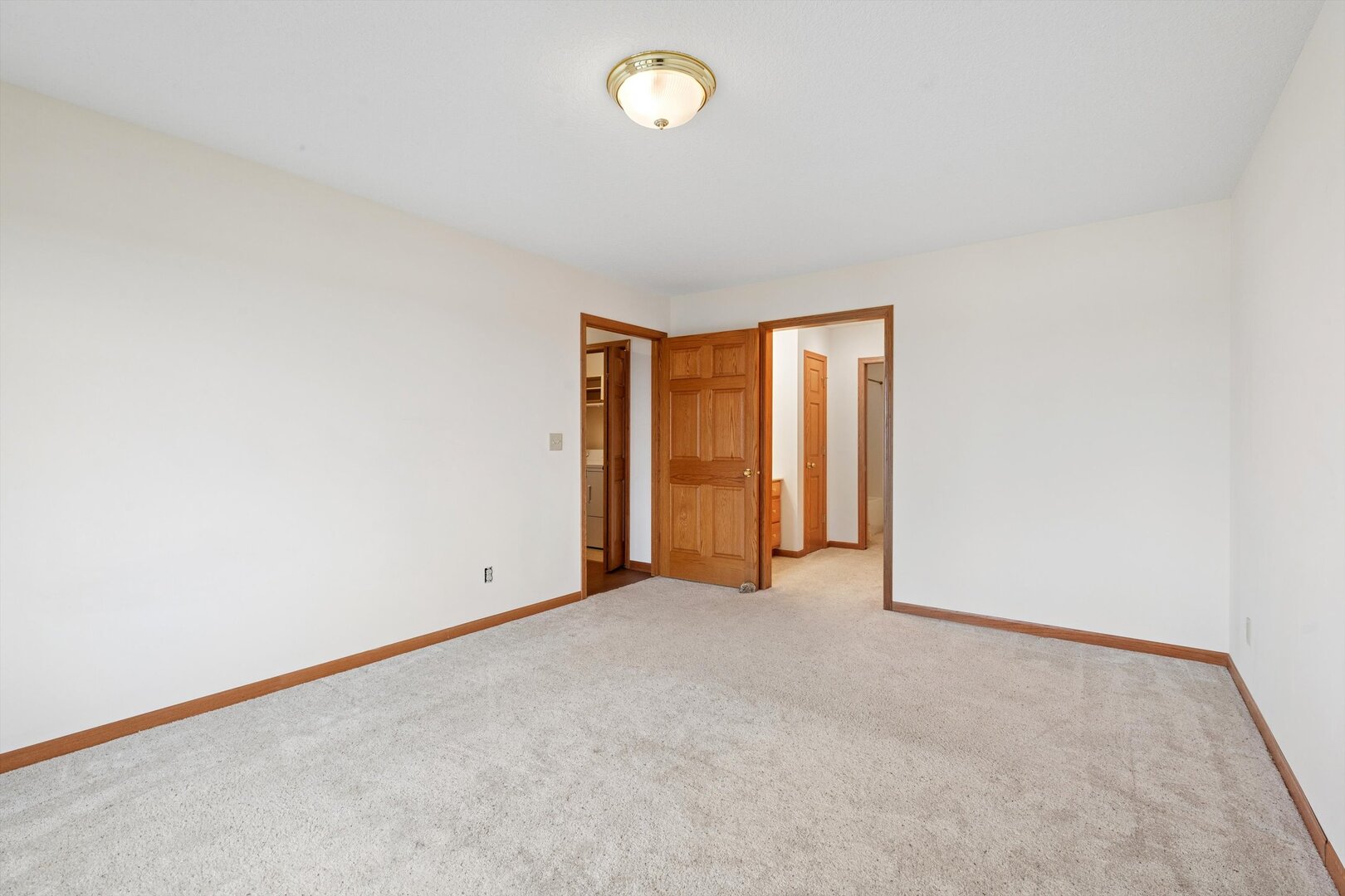 118 5th Street, Unit 2 Fulton, IL 61252 - Photo 17 of 54 an empty room with fan and windows
