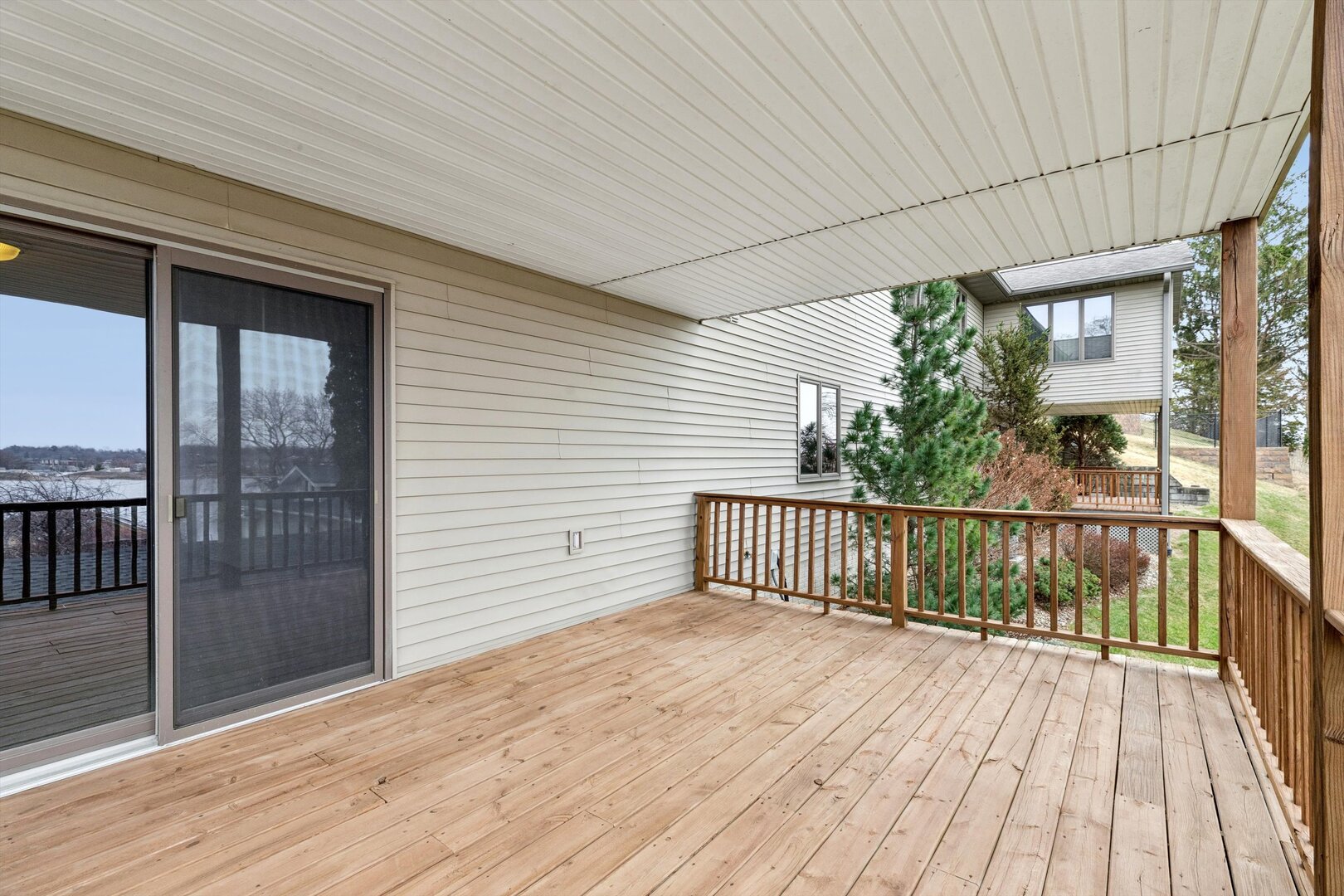 118 5th Street, Unit 2 Fulton, IL 61252 - Photo 28 of 54 a view of a balcony with wooden floor
