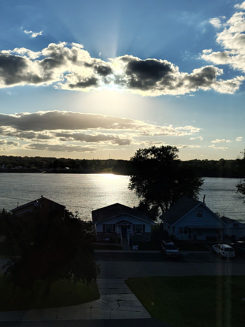 118 5th Street, Unit 2 Fulton, IL 61252 - Photo 46 of 54 a view of a lake from a yard