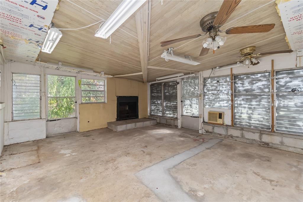 1730 Neptune Road Kissimmee, FL 34744 - Photo 21 of 38 a view of an empty room with a window