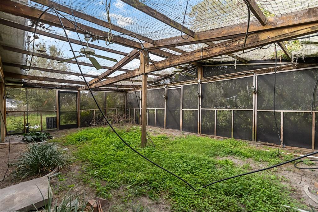 1730 Neptune Road Kissimmee, FL 34744 - Photo 23 of 38 a view of yard with trampoline